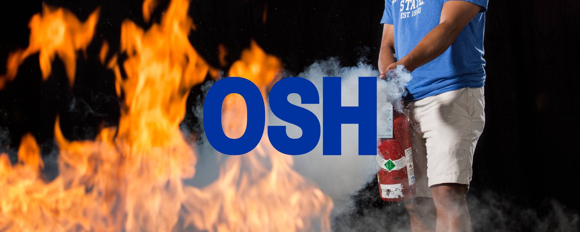 man extinguishing a fire